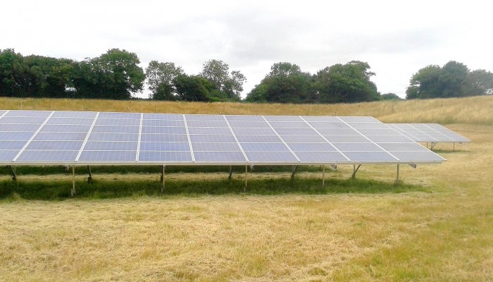 A set of solar panels near Cambridge working at full capacity thanks to a good cleaning