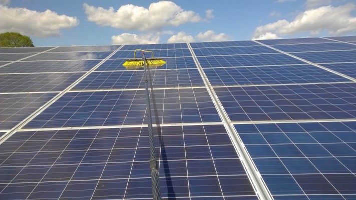 Solar panel farm near Cambridge cleaning in progress