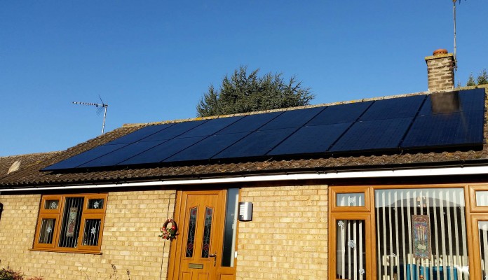Large number of solar panels on a bungalow type house near Cambridge