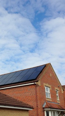 Large detached house with large number of solar panels near Cambridge